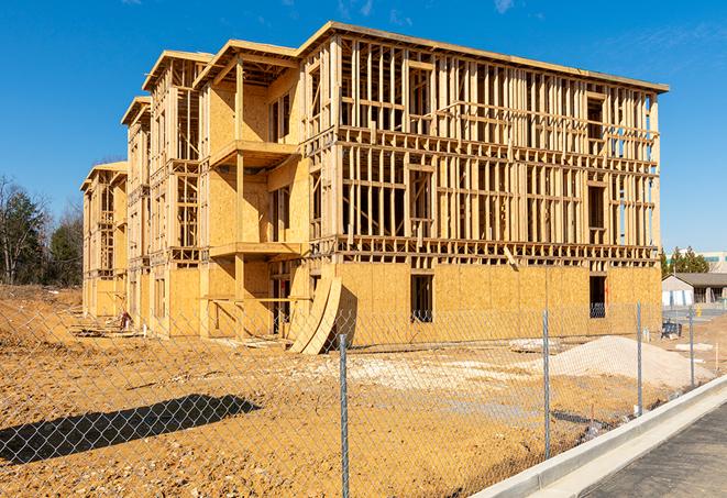 a snapshot of temporary chain link fences protecting a large construction project from unauthorized access in Brea, CA